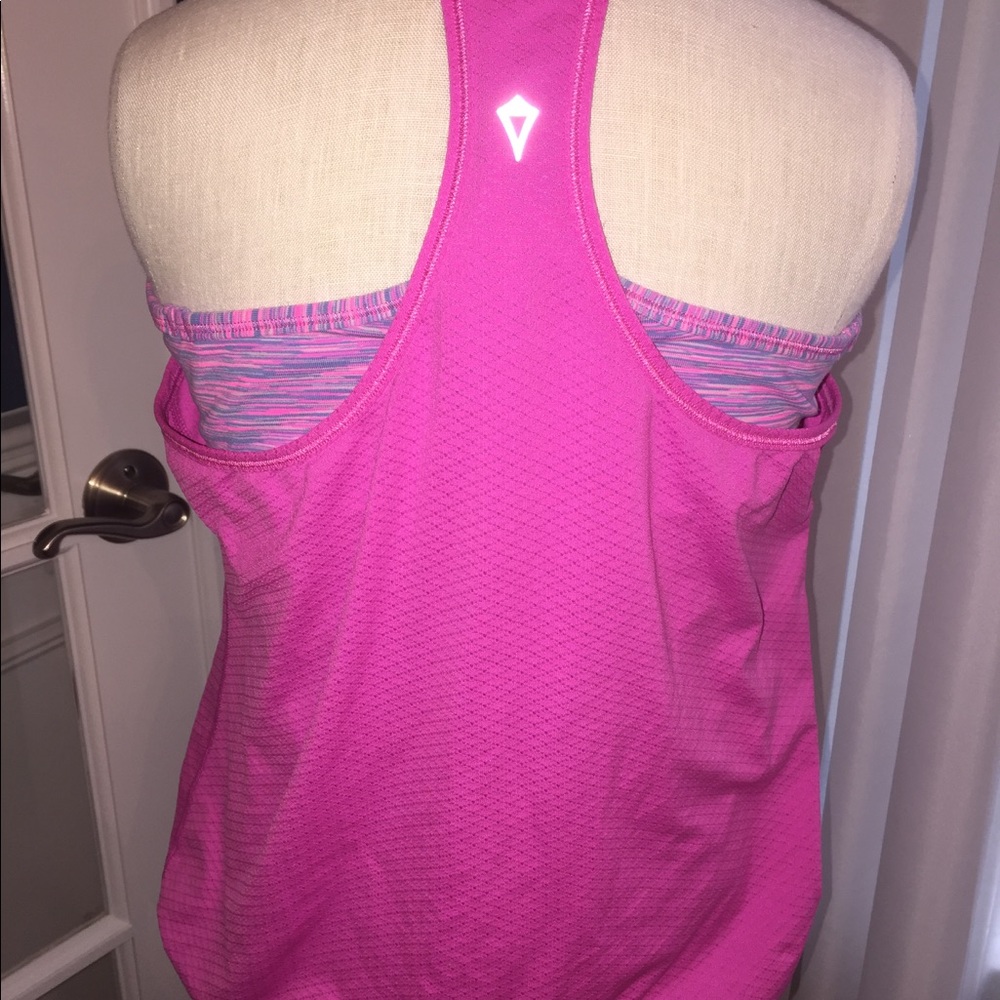 Two 2 ivivva kids tank tops size 14